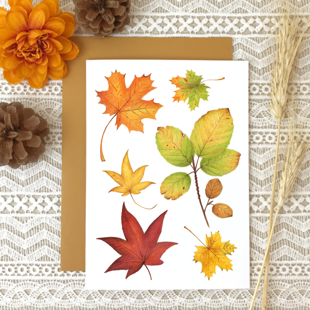 Fall note card design #1 with a collage of watercolor autumn leaves.